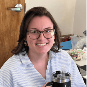 Headshot of Julia Knowles, Accounts Receivable Specialist and December Employee of the Month at Oriol Health Care, smiling in a professional setting.