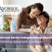 Senior woman relaxing at home with supportive caregiver, representing National Senior Independence Month and aging with confidence supported by Oriol Home Health.